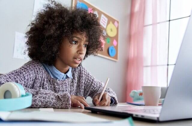 Student working with her laptop