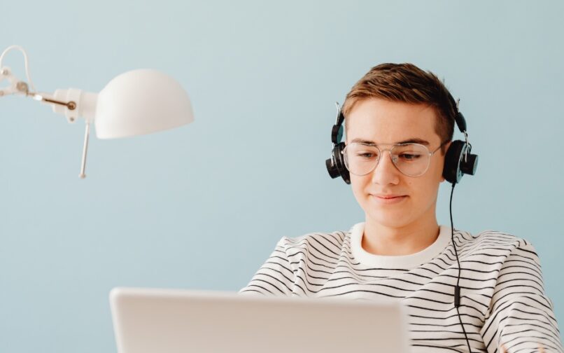 student online with headphones